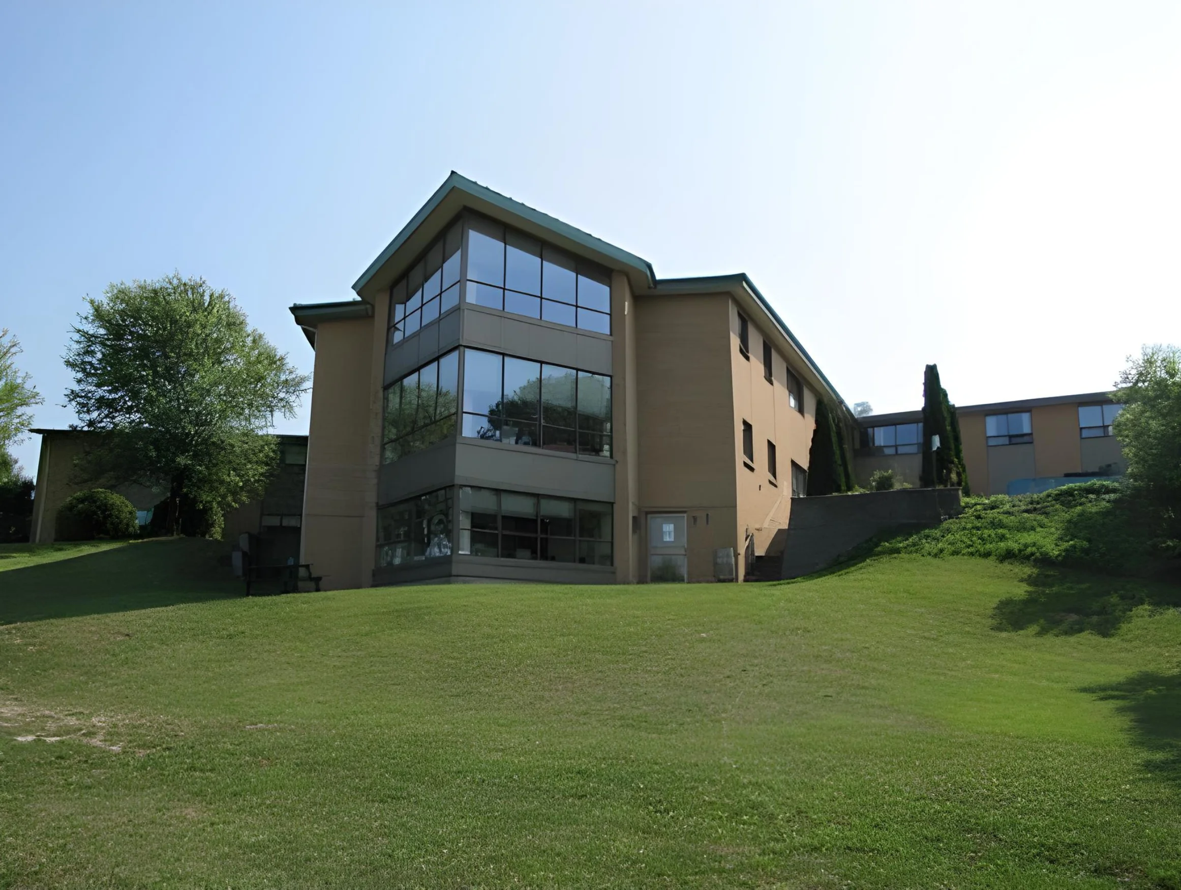 The Manor building and green grounds in Little Current
